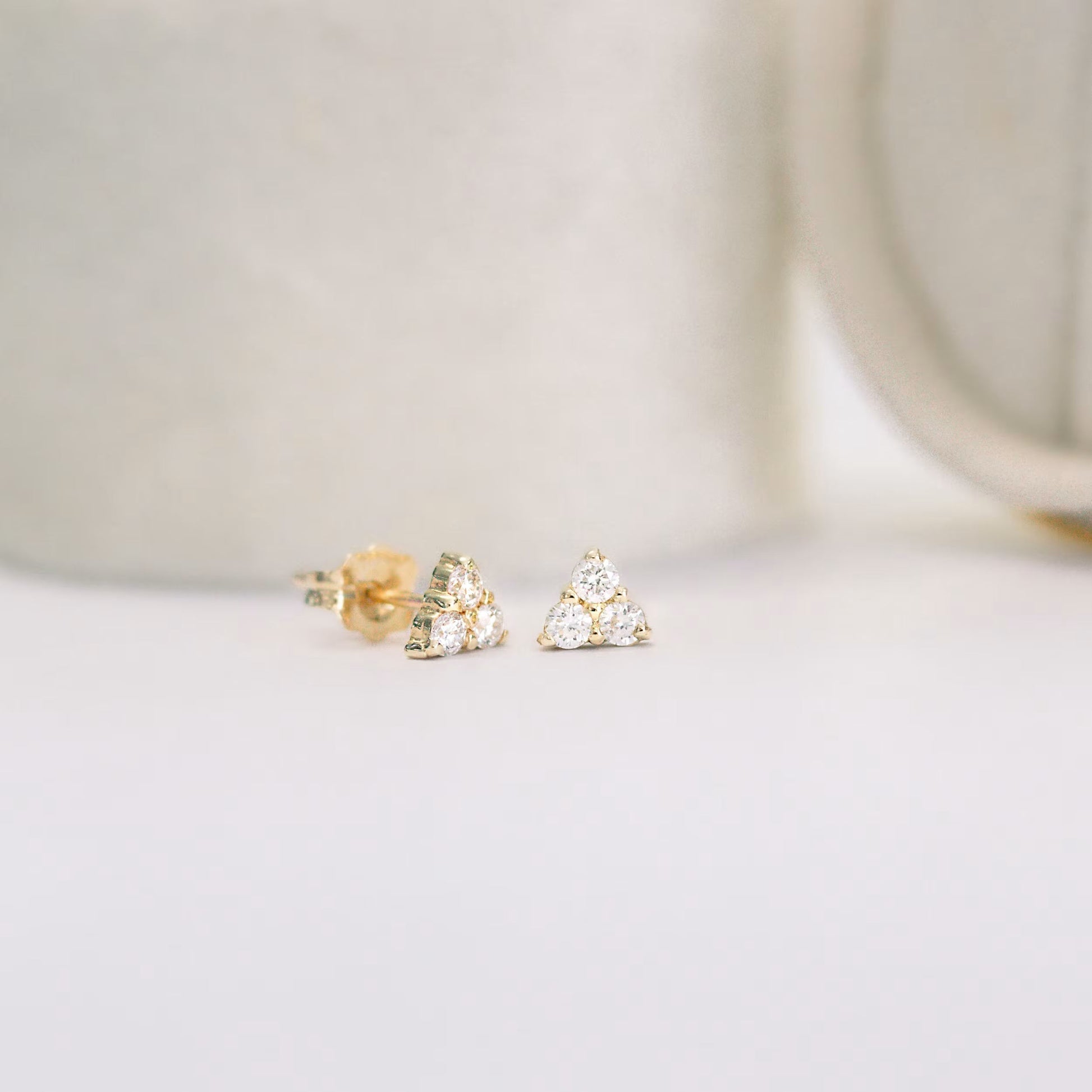 0.30 TCW Round Cut Moissanite Three Stone Stud Earrings in Gold 3