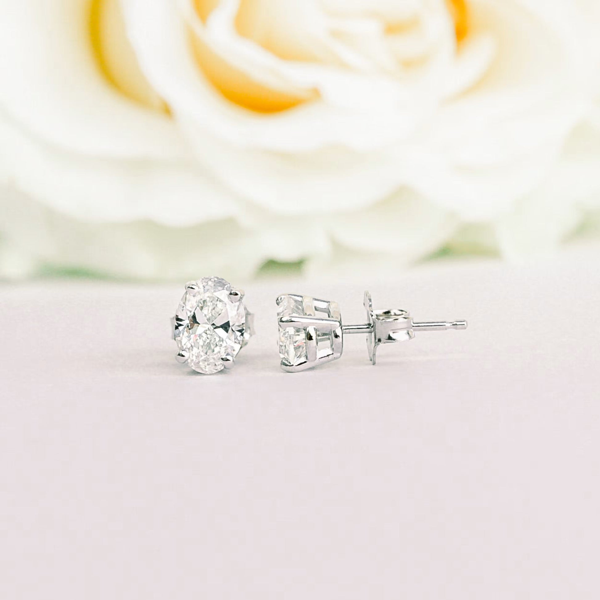 1.50 TCW Oval Shape Moissanite Stud Earrings in Gold 3