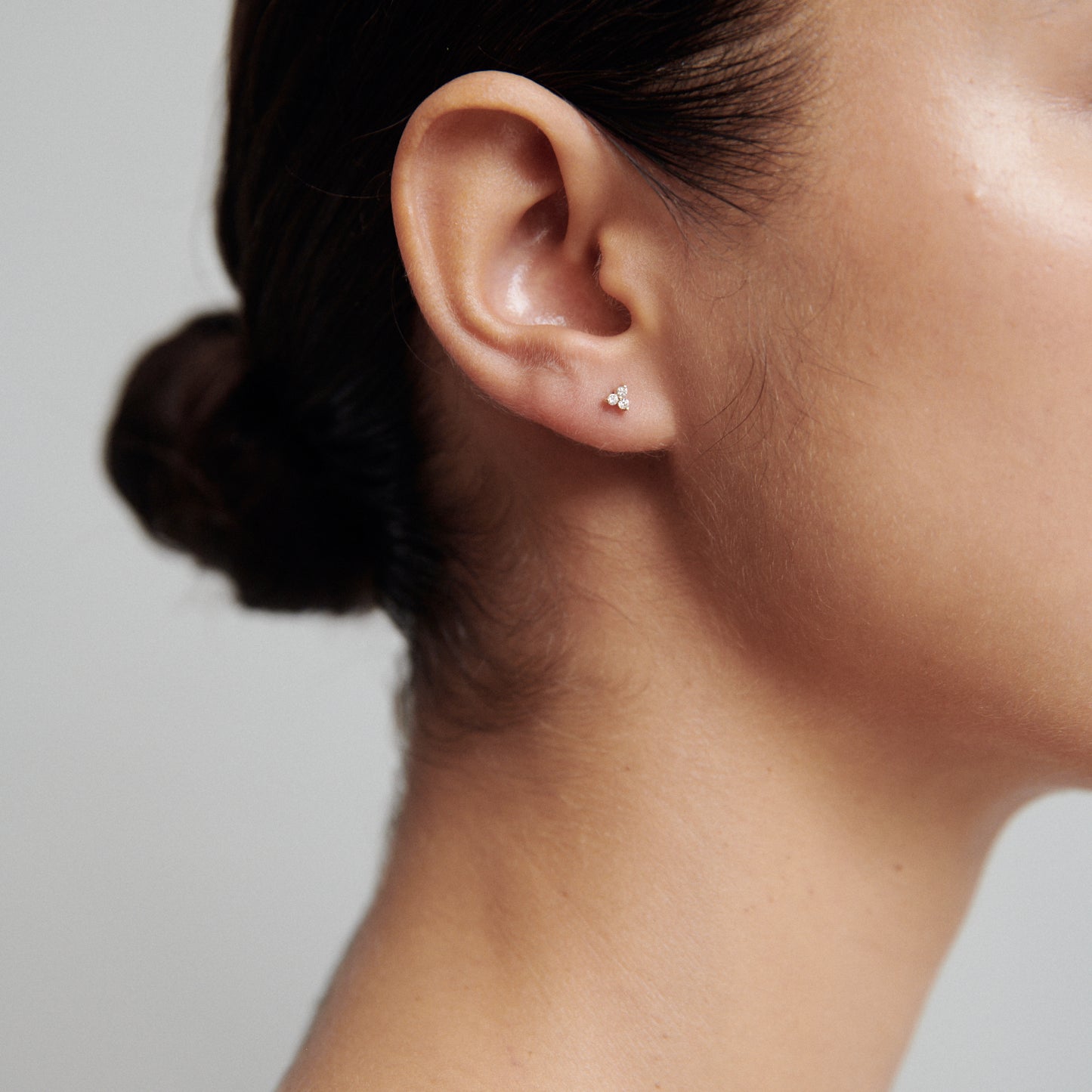 0.05 TCW Round Cut Moissanite Stud Earrings in Gold 4