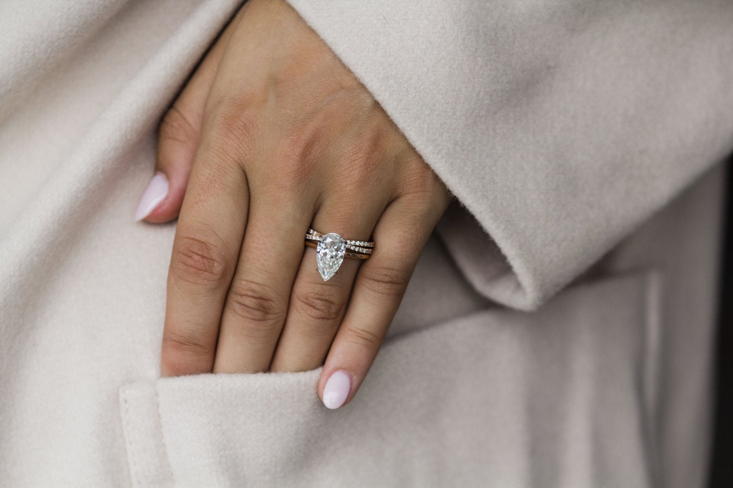 4.50 CT Pear Moissanite Ring Featuring Bridge Style 4