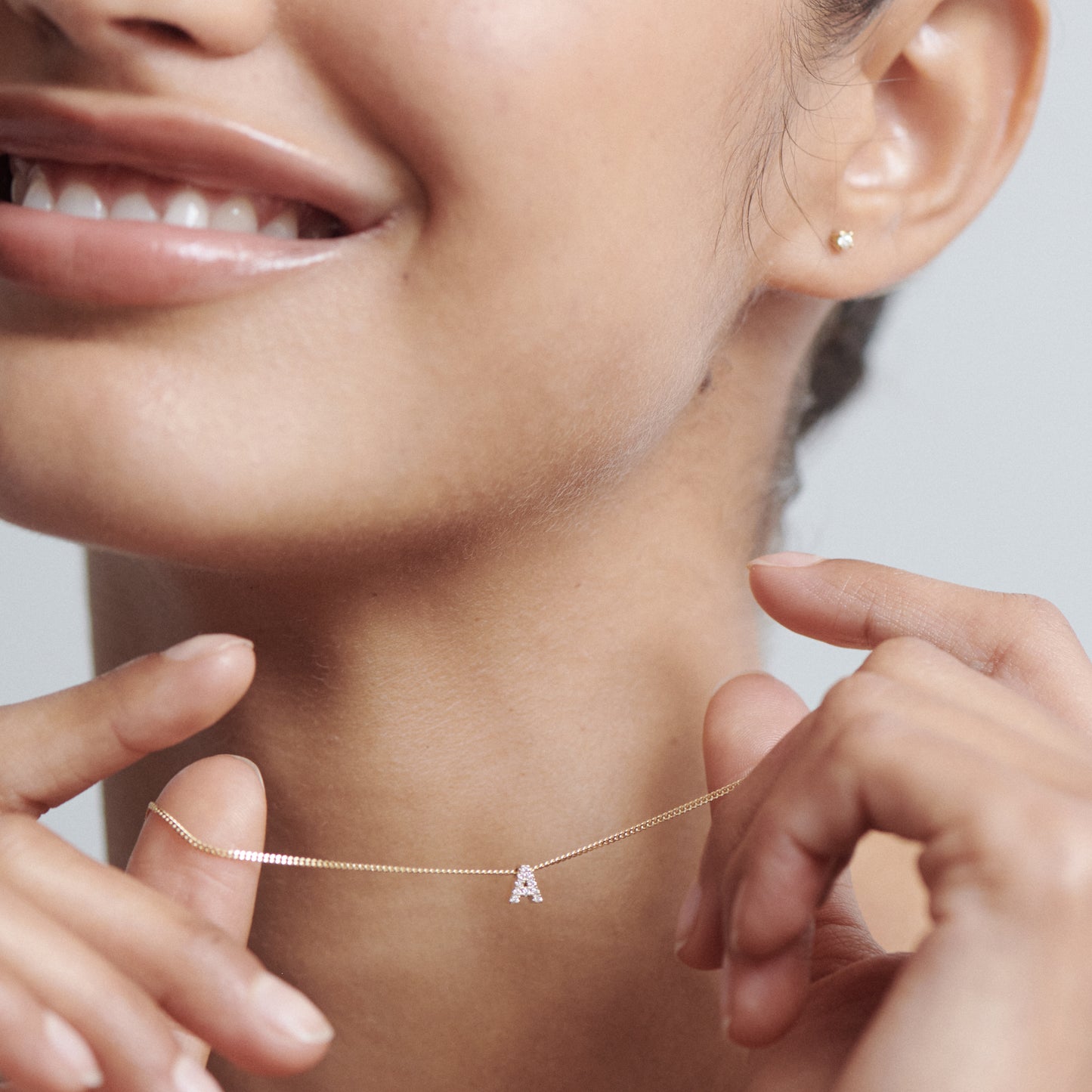 0.085 TCW Round Moissanite Diamond Letter Pendant Necklace in Solid Gold 1