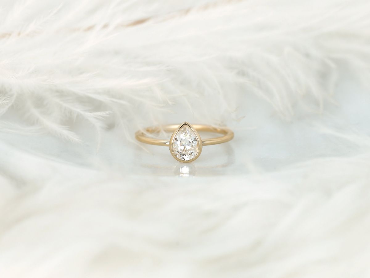 Stunning 0.75 CT Pear Moissanite Engagement Ring With Bezel Design 1