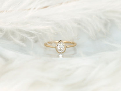 Stunning 0.75 CT Pear Moissanite Engagement Ring With Bezel Design 1