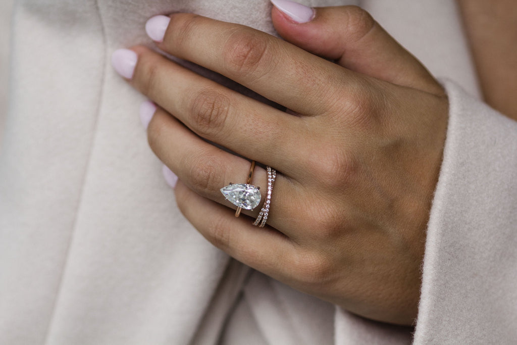 4.50 CT Pear Moissanite Ring Featuring Bridge Style 3