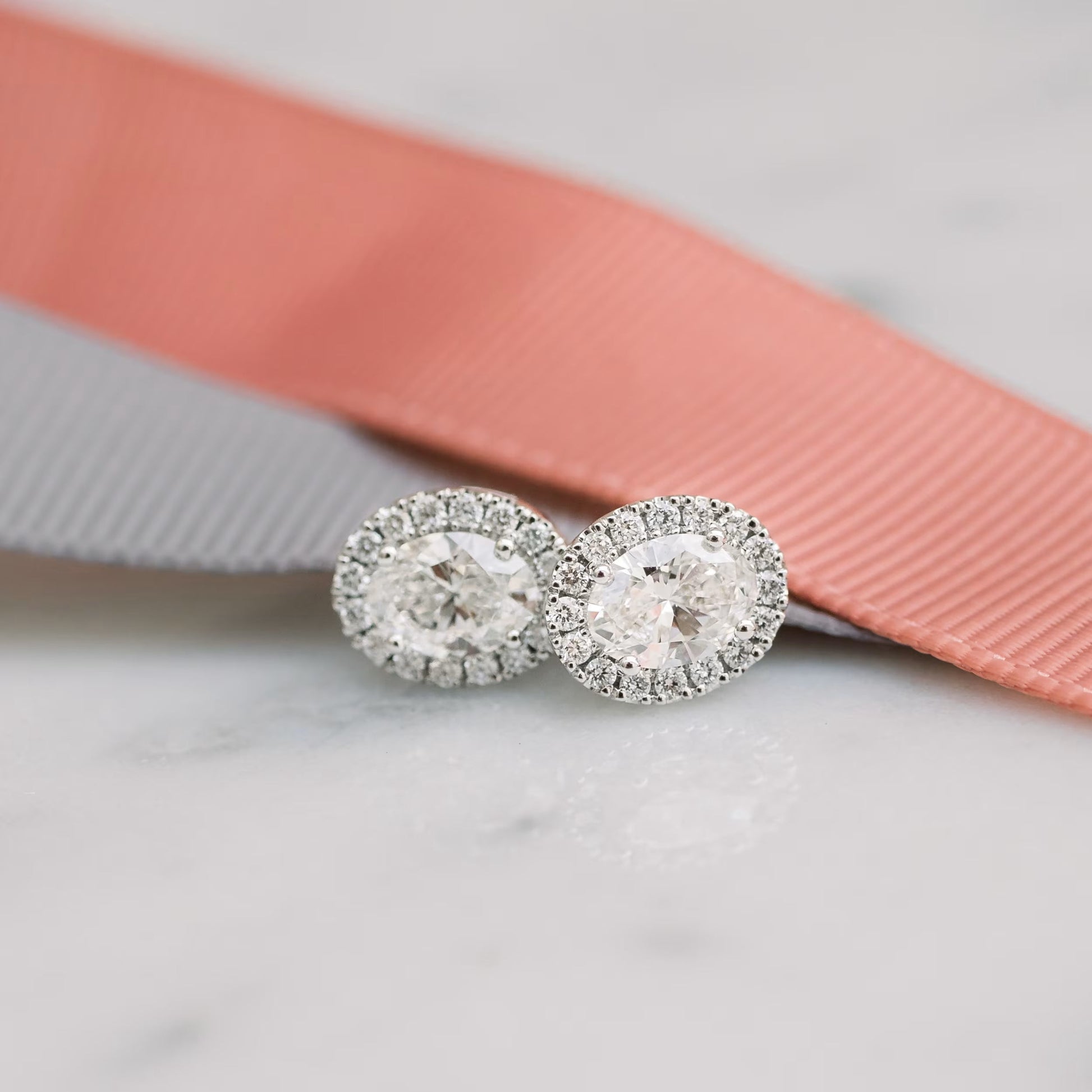 1.50 TCW Oval Shape Moissanite Halo Stud Earrings in Gold 1