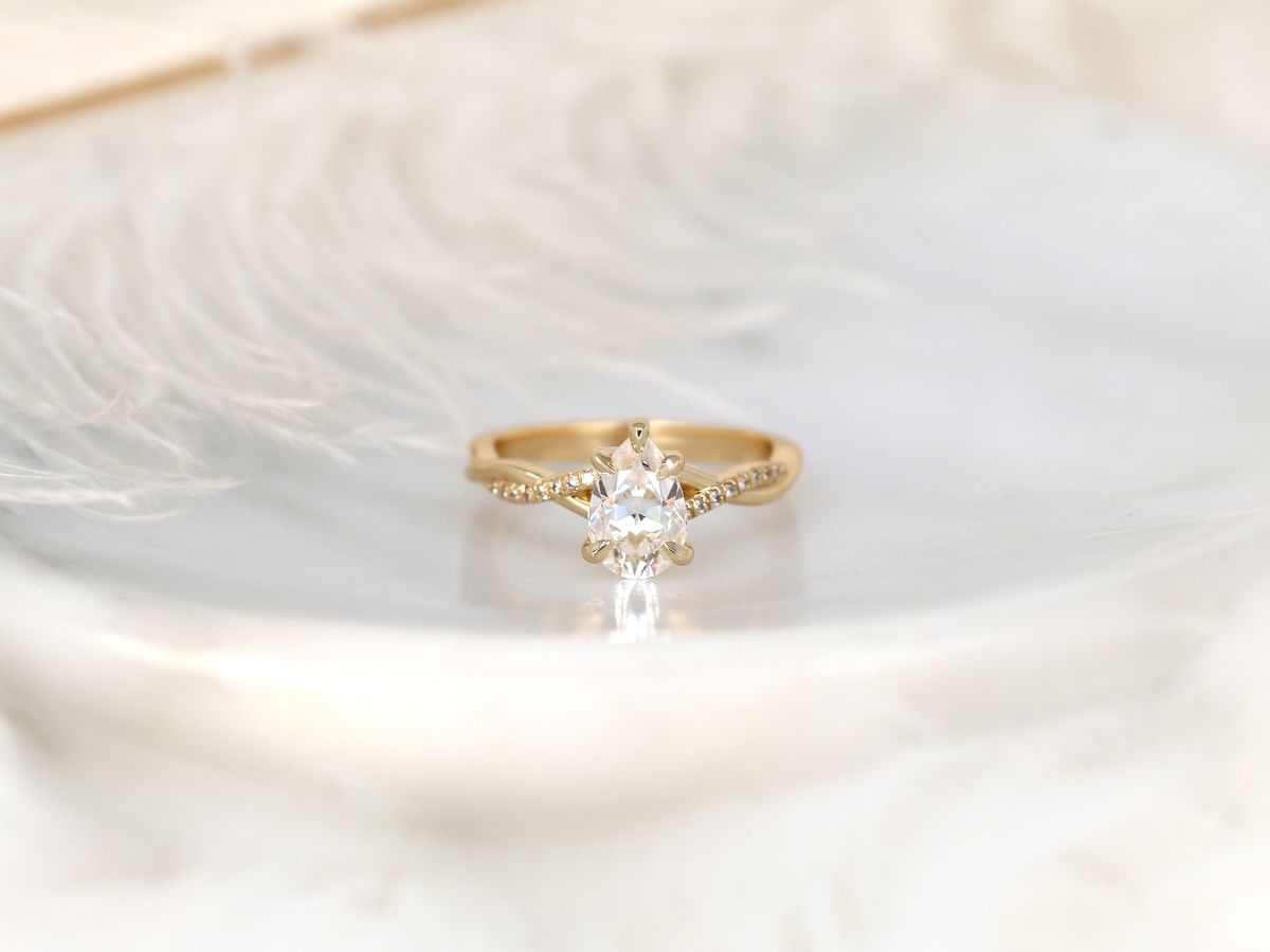 Stunning 1.50 CT Pear Moissanite Engagement Ring with Twisted Pave Design 1