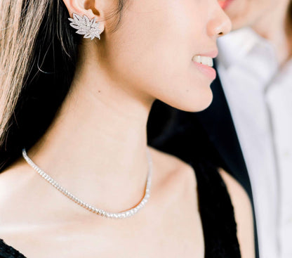 2.0 TCW Round Cut Moissanite Feather Stud Earrings in Gold 3